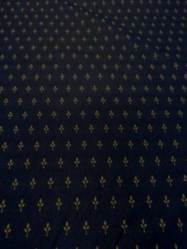 Coton faconne petite fleurs bleu a motifs beige