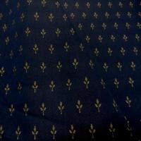 Coton faconne petite fleurs bleu a motifs beige1