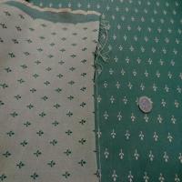 Coton faconne petite fleurs vert a motifs jaune