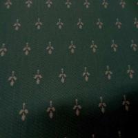 Coton faconne petite fleurs vert a motifs jaune0