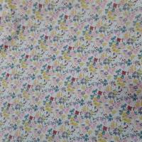 Coton popeline beige clair imprime liberty petite fleurs