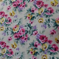 Coton popeline beige imprime rosiers ton rose vert et jaune