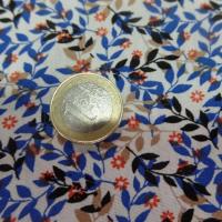 Coton popeline blanche imprimé liberty fleurs bleu et noir