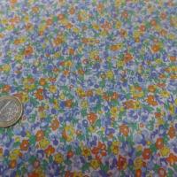 Coton popeline blanche imprime liberty fleurs bleu jaune orange