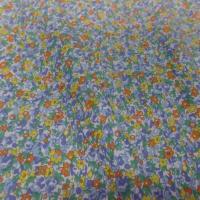 Coton popeline blanche imprime liberty fleurs bleu jaune orange