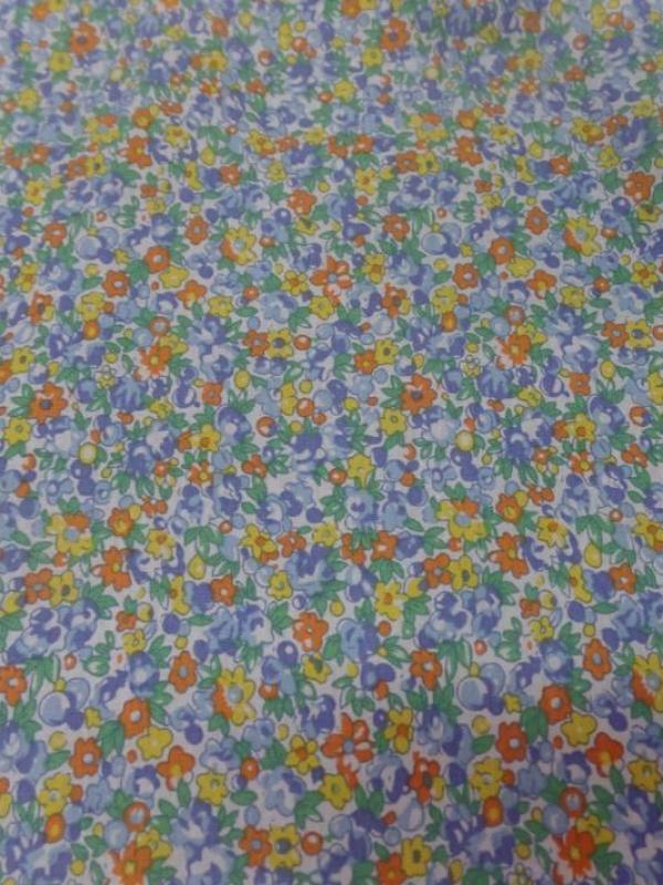 Coton popeline blanche imprime liberty fleurs bleu jaune orange