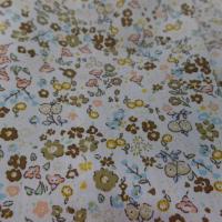 Coton popeline blanche imprime liberty fleurs kaki marron jaune et bleu