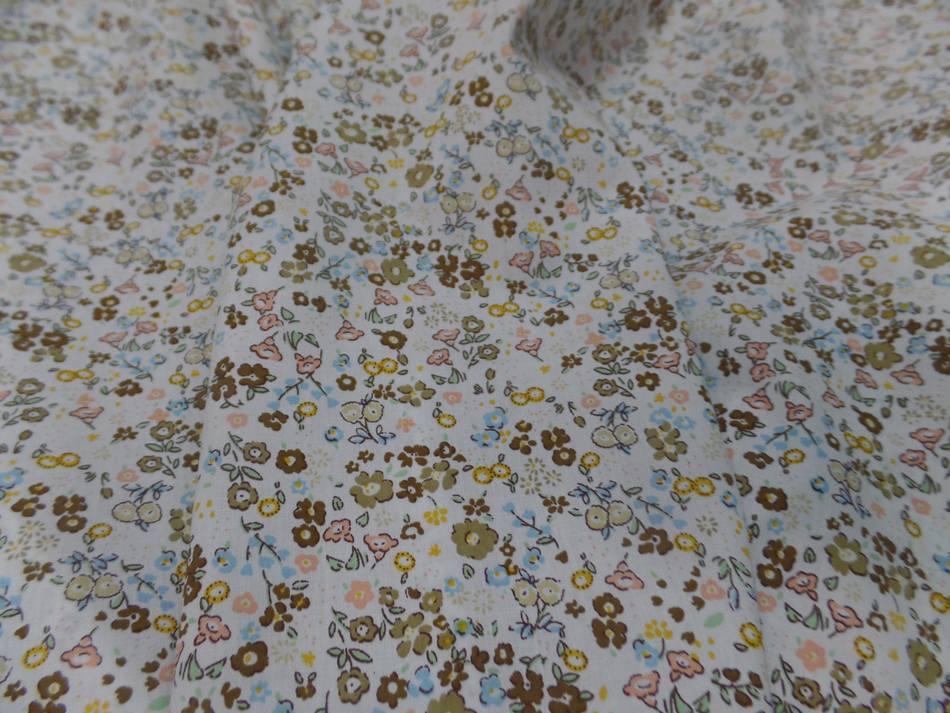 Coton popeline blanche imprimé style liberty fleurs kaki marron jaune et bleu en ligne