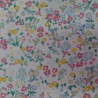 Coton popeline blanche imprime liberty fleurs ton bleu vert et jaune