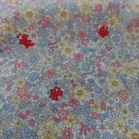 Coton popeline blanche imprimé liberty fleurs ton gris,jaune;rose et rouge