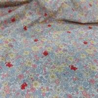 Coton popeline blanche imprimé liberty fleurs ton gris,jaune;rose et rouge
