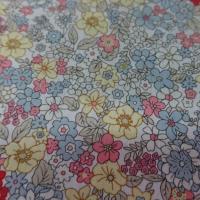 Coton popeline blanche imprimé liberty fleurs ton gris,jaune;rose et rouge