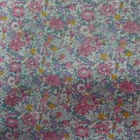 Coton popeline blanche imprime liberty fleurs ton rose