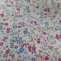 Coton popeline blanche imprimé liberty fleurs rouge , vert et bleu