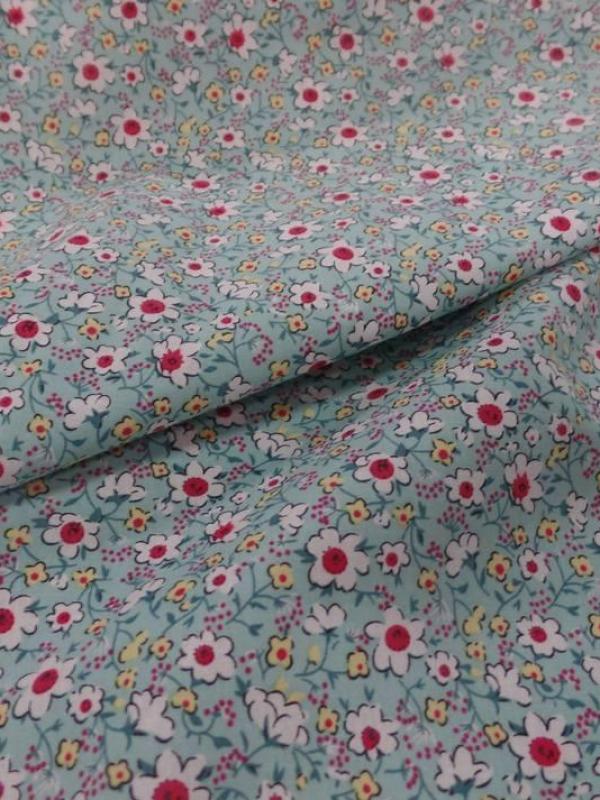 Coton popeline bleu lagon imprimé liberty fleurs ton blanc et rouge