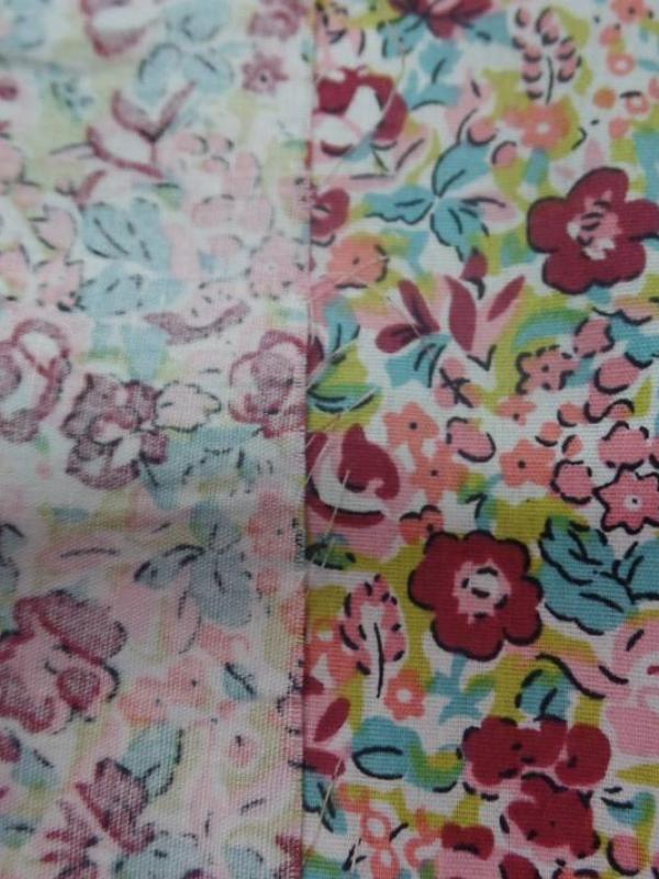 Coton popeline imprime liberty fleurs ton bordeaux bleu et rose