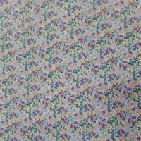 Coton popeline imprimé liberty fleurs ton lavande ,jaune et vert