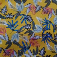 Coton popeline moutarde imprime feuillages ton blanc bleu noir