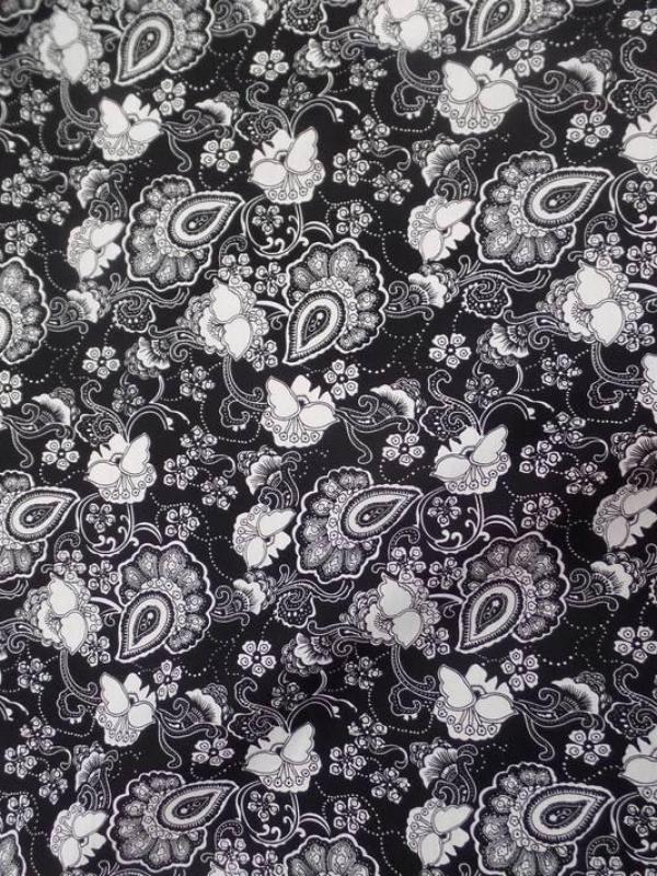 Coton popeline noire imprime fleurs ton blanc