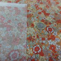 Coton popeline orange imprime liberty motifs petite fleurs