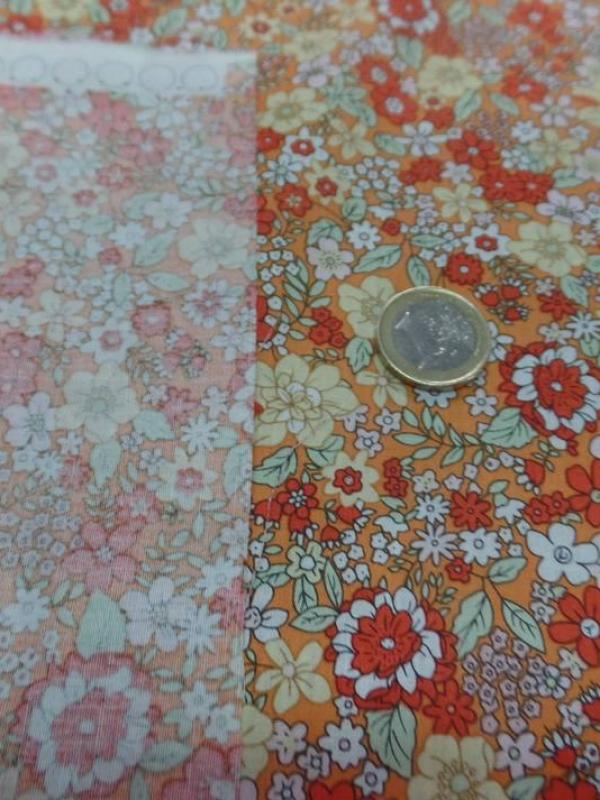 Coton popeline orange imprime liberty motifs petite fleurs