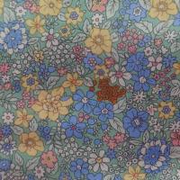 tissu Coton popeline verte imprimé liberty fleurs ton bleu ,rose ,jaune