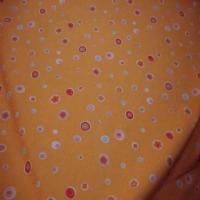 Coton ton orange imprime en 1 50m de large