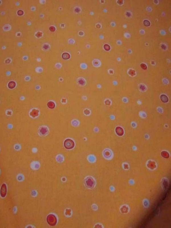 Coton ton orange imprime en 1 50m de large