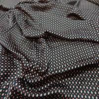 Coupon de beau satin noir imprime 1 50m7