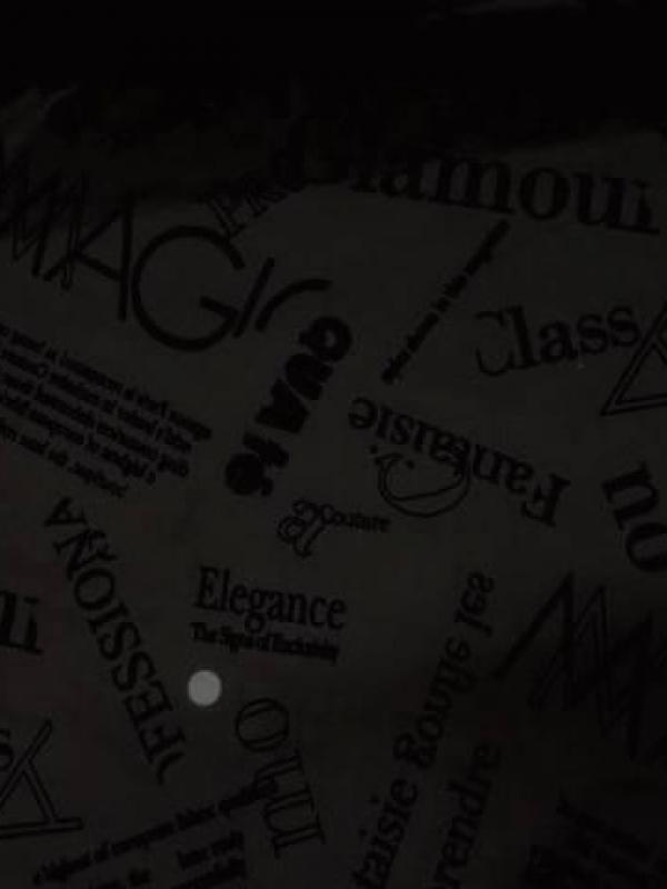 Coupon de gabardine coton lycra marron cafe flokes ecriture aspect velours noir 1