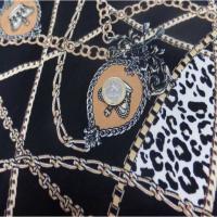 Coupon de gabardine coton lycra noire imprime dore 1 80m5