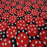 Coupon de lycra imprime ton noir rouge a pois blanc 1m5