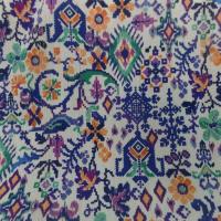 Crépon viscose blanche imprimé ton bleu vert orange fils lurex doré