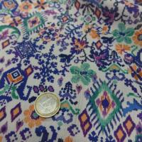 Crépon viscose blanche imprimé ton bleu vert orange fils lurex doré