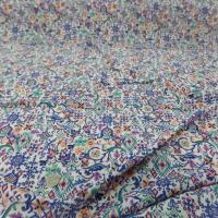 Crépon viscose blanche imprimé ton bleu vert orange fils lurex doré