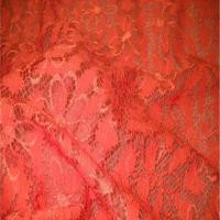 Dentelle brode sur resille ton orange