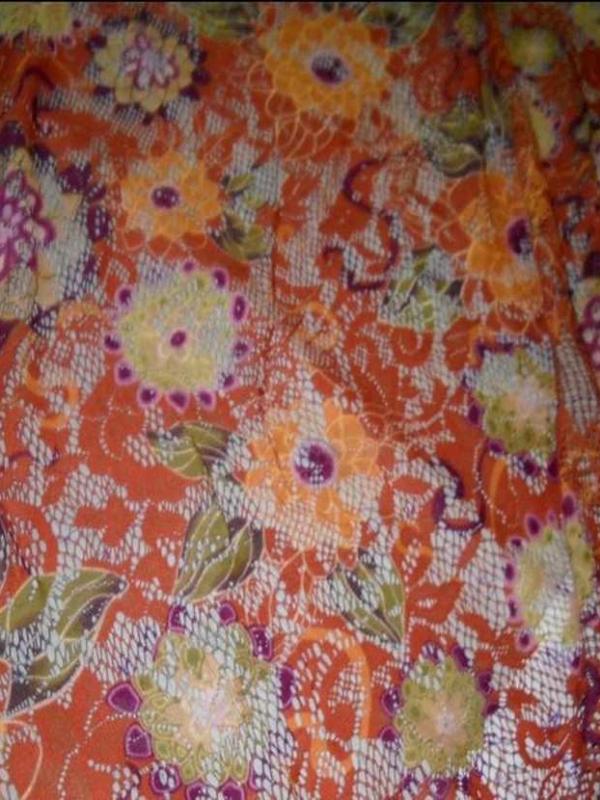 Dentelle lycra imprime fleurs ton orange0