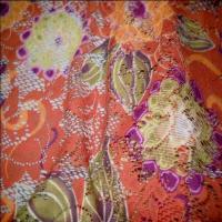 Dentelle lycra imprime fleurs ton orange7