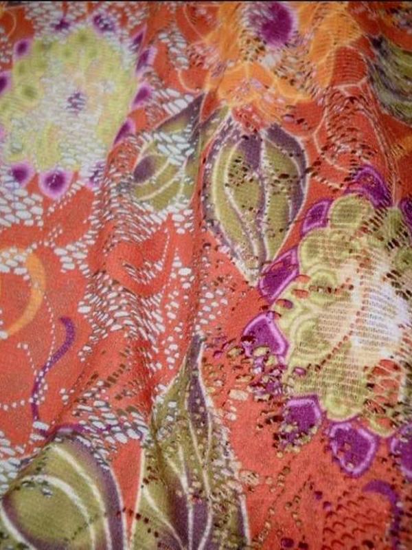 Dentelle lycra imprime fleurs ton orange0