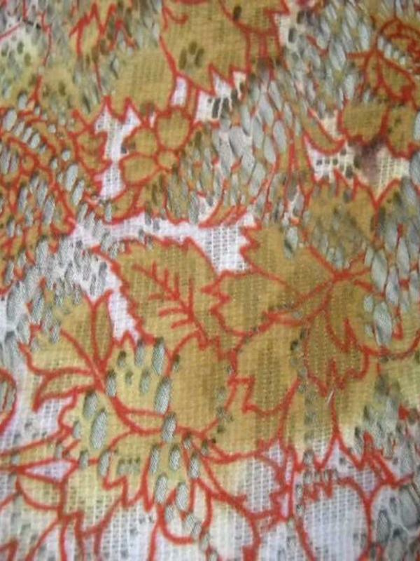 Dentelle lycra imprime ton orange