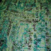 Dentelle lycra imprime ton vert