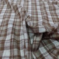 Drap de laine blanc cassé a carreaux ton marron en ligne