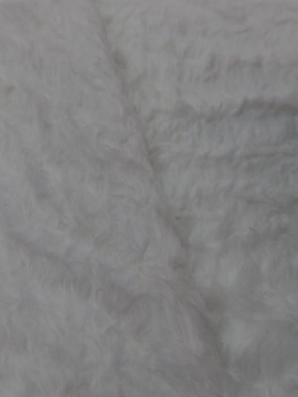 Fausse fourrure blanche montée sur gabardine en coton