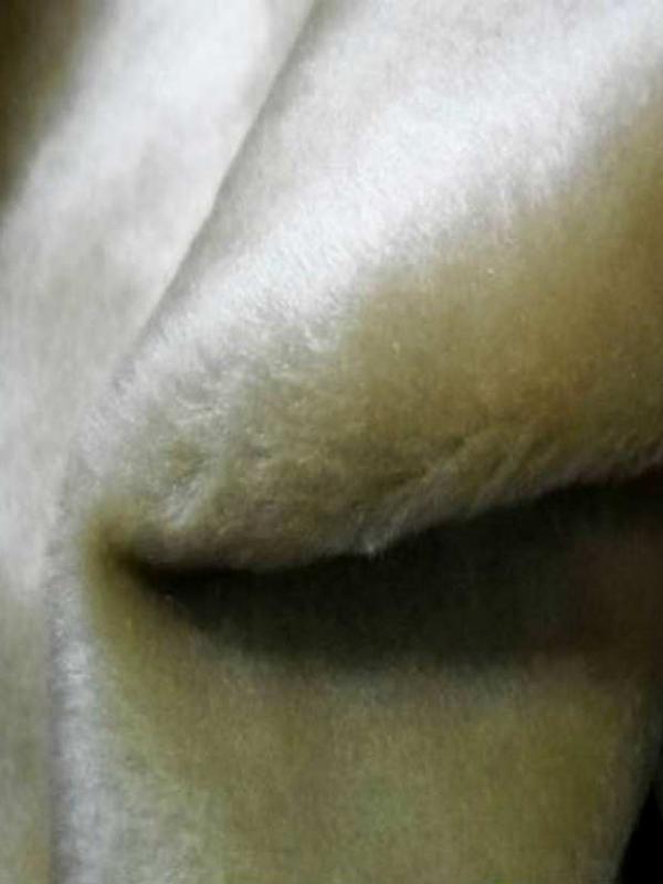Fausse fourrure touche velours beige