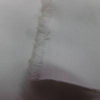 Gabardine coton 100% blanc légèrement cassé 205 gr m²