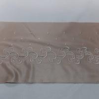 Galon de jersey polyester brode ton beige dore en 21cm