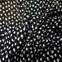 Jersey melange ton noir blanc imprime