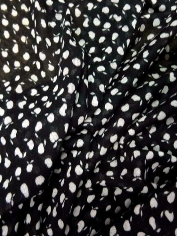 Jersey melange ton noir blanc imprime