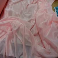 Jersey polyester rose clair legerement transparent