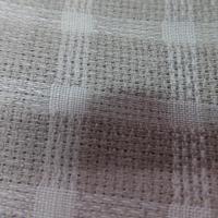 tissu Lin blanc imprimé carreaux beige et noir